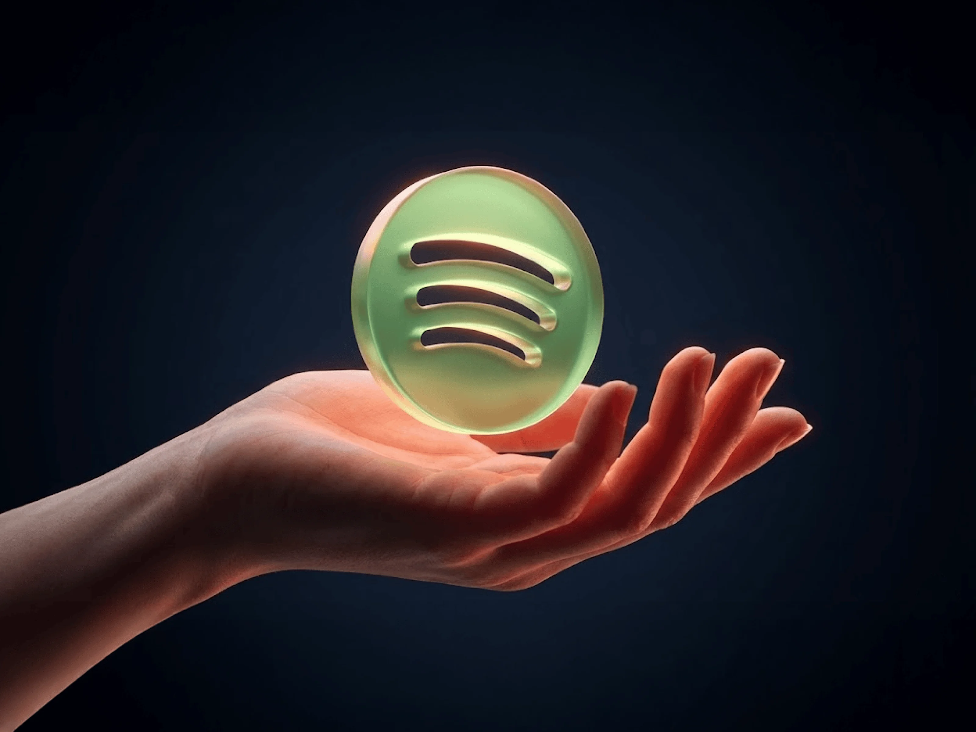 Hand Holding Glowing Logo